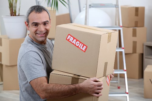 Person placing belongings into a Bromley storage unit